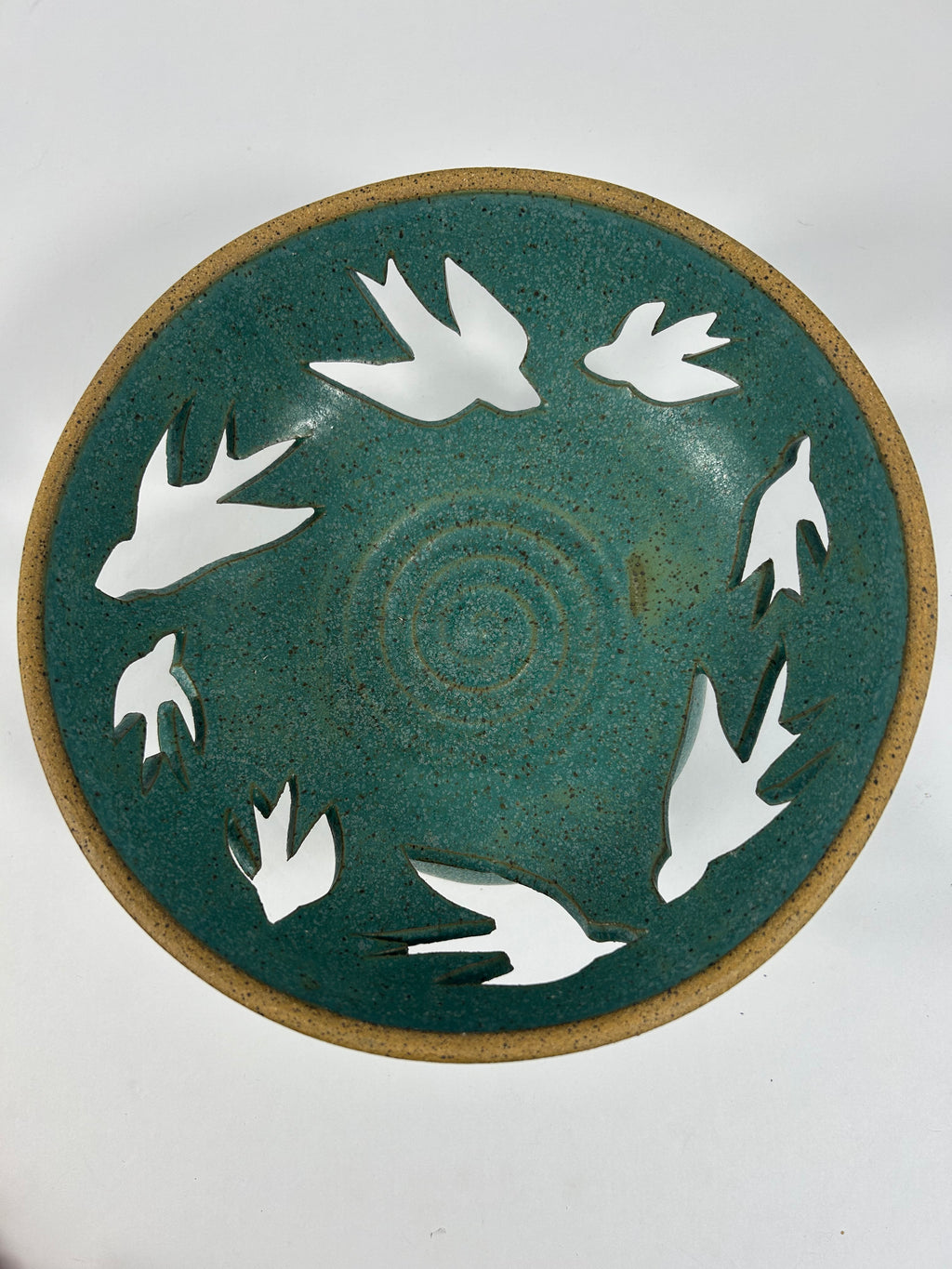 Stoneware teal  bowl with swallow cut-outs