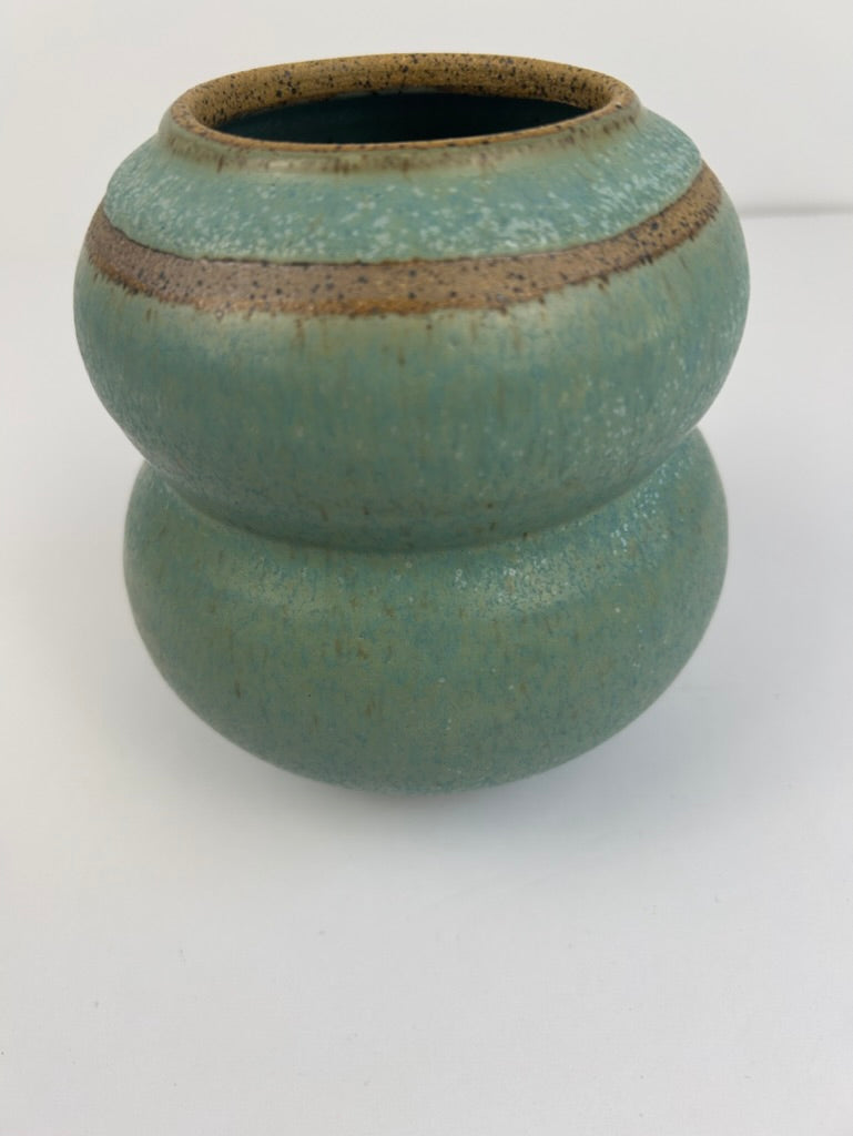 Stoneware 2-tier vase with blue-green speckled glaze and tan band. 